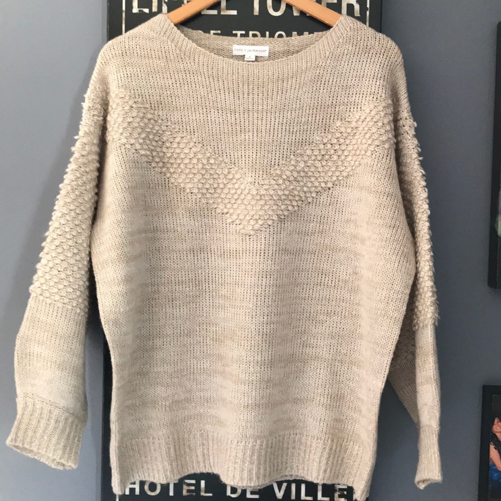 Francesca’s tan sweater